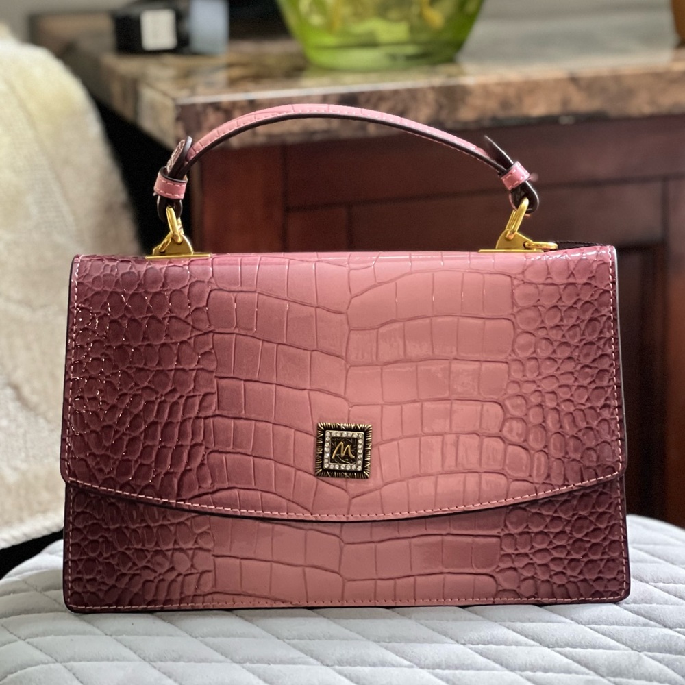 Pink embossed leather bag